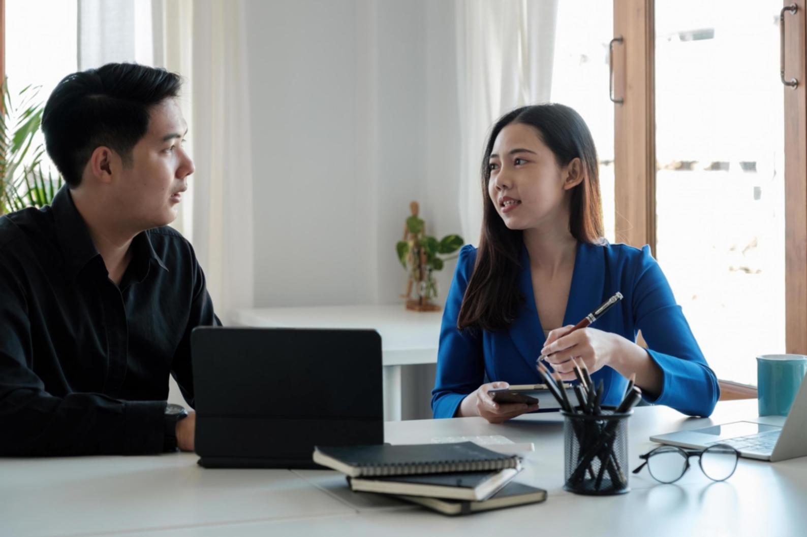 Team collaboration session reviewing content strategy frameworks and search optimization techniques
